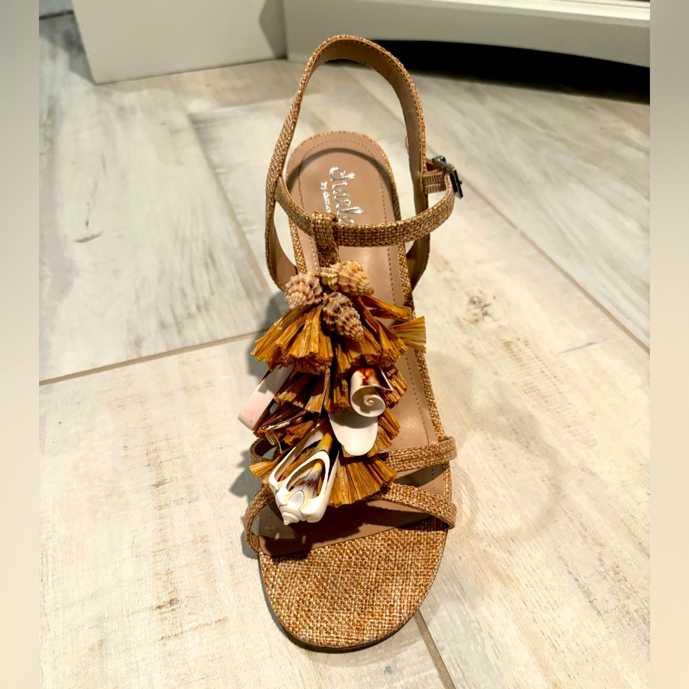Boutique Tan linen heels adorned with shells by Charles David.